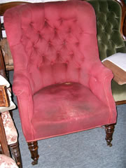 SOLD - A very nice high backed library with buttoned back and turned legs