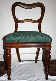 Victorian Mahogany balloon back chair, as shown.