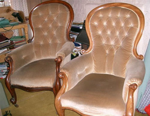 SOLD - A very near matching pair of Victorian mahogany showood armchairs