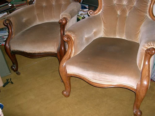 SOLD - A very near matching pair of Victorian mahogany showood armchairs