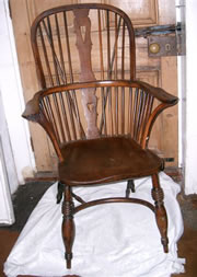 A very early Windsor chair c1780/1800 in yew and elm