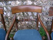 A Will IV Mahogany carver with scroll arms stuffover seat and well carved back in excellent condition