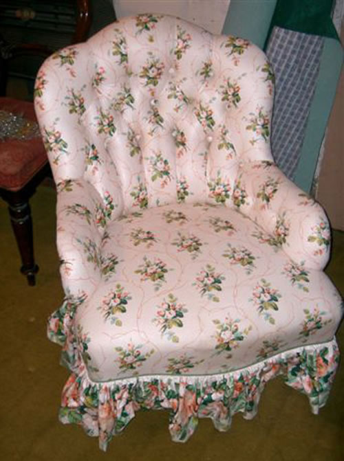 SOLD - A late Victorian buttoned back tub chair