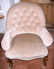 A very nice Victorian buttoned back chair with mahogany cabriole legs