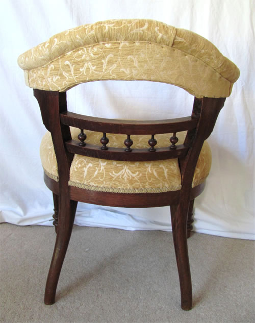 SOLD - A magnificent large solid oak bowed back chair