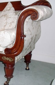 Double scroll end Victorian sofa with raised back